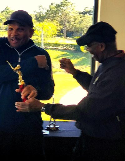 Mike Epps Receives a Trophy for Winning the Initial PDO Golf Challenge