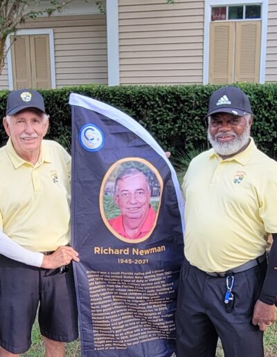 PDO Members at the 2025 Commemorative Golf Classic with the Richard Newman Banner